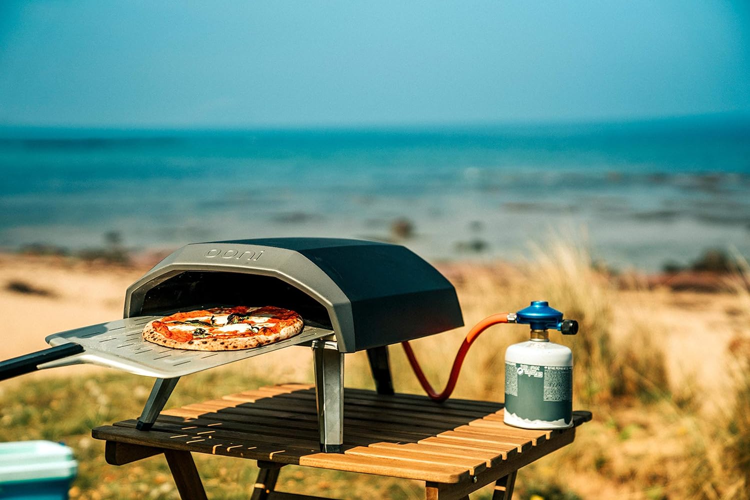 Holiday Offer - Save On Ooni 12 Perforated Pizza Peel with Ooni Koda 12 Portable Gas Pizza Oven - Outdoor Pizza Oven with Perforated Pizza Peel Included for Authentic Stone Baked Pizzas